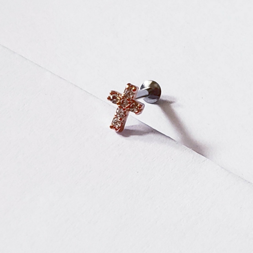 16g cross Tragus helix conch cartilage piercing